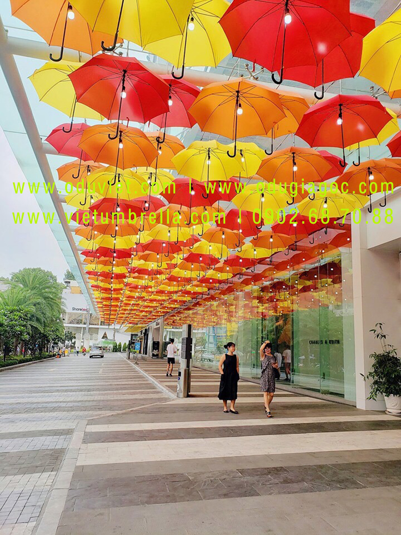 xưởng sản xuất ô dù cầm tay in logo quảng cáo
